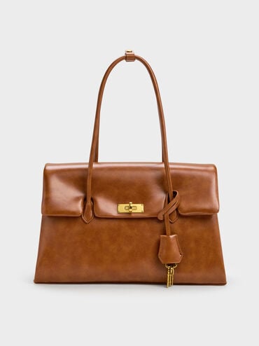 กระเป๋าโท้ททรงสี่เหลี่ยมคางหมูรุ่น Kerry, สีดิสเทรสด์แทน, hi-res