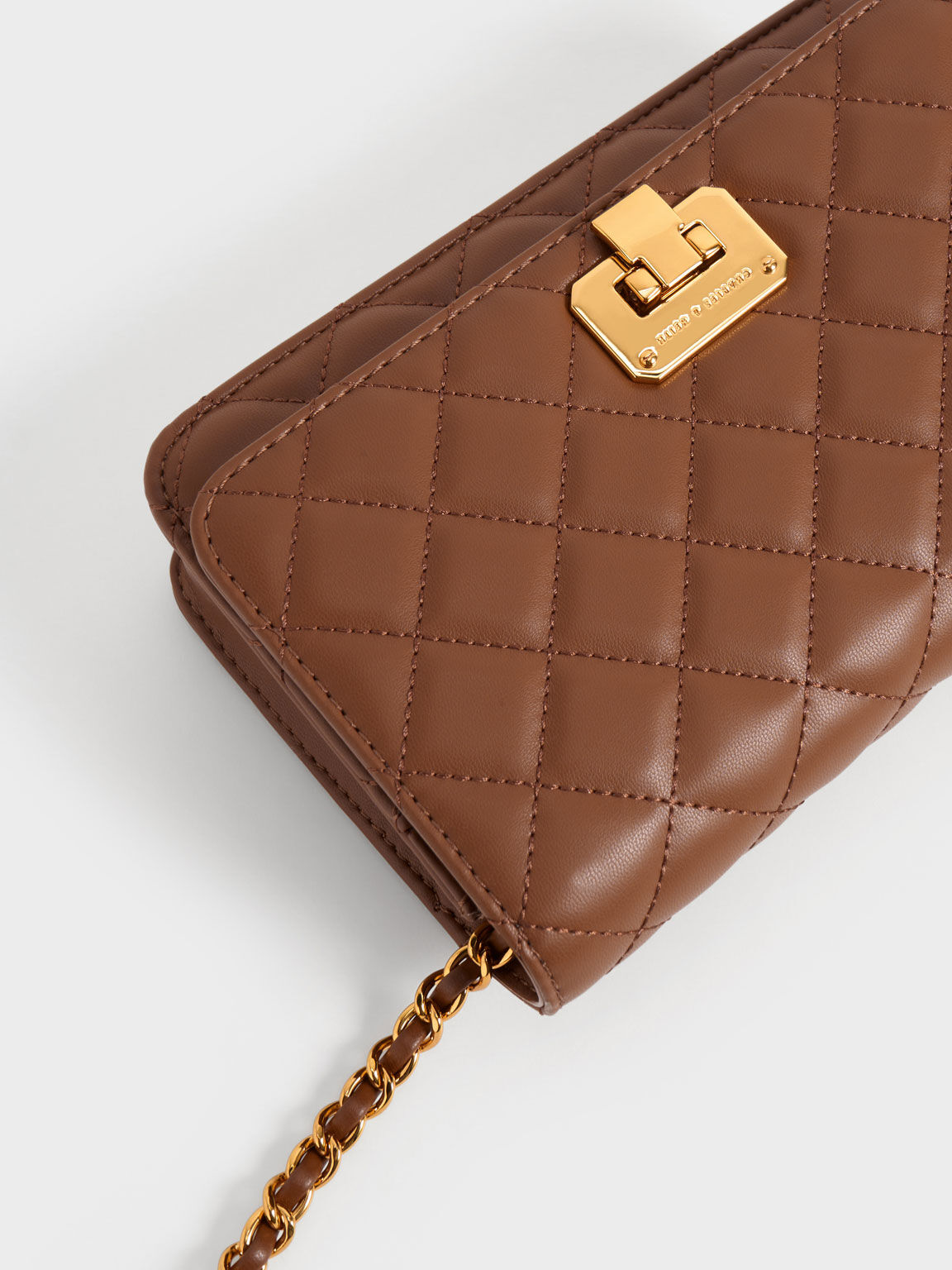 Charles & keith top quilted clutch