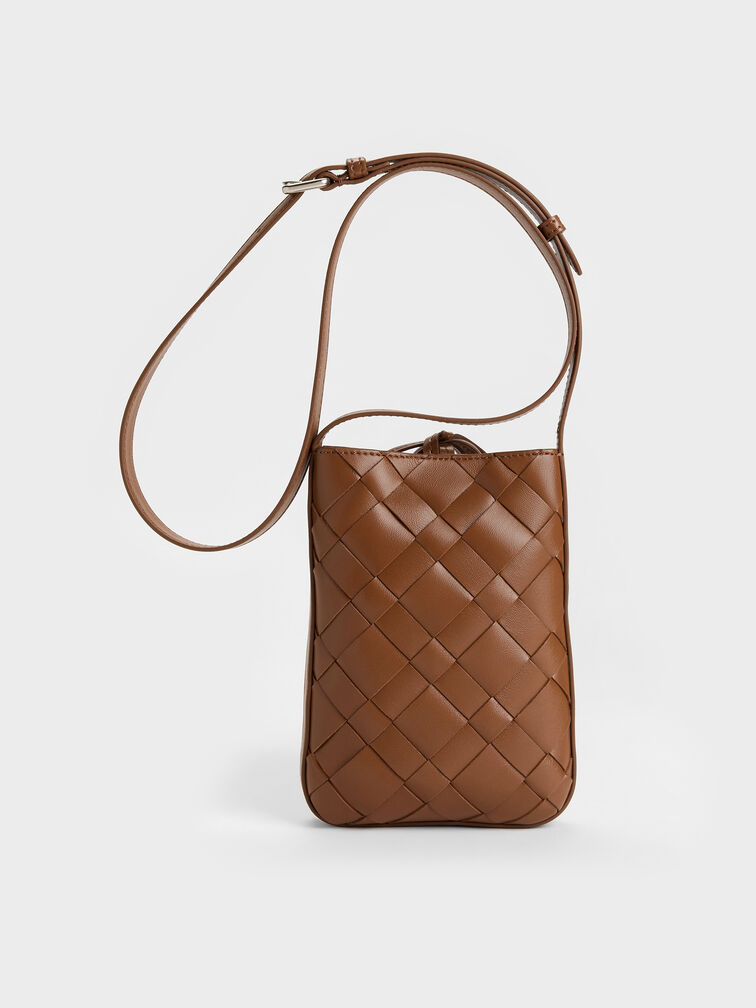 กระเป๋าเพาช์ดีเทลงานสานประดับพู่รุ่น Ivette, สีช็อคโกแลต, hi-res