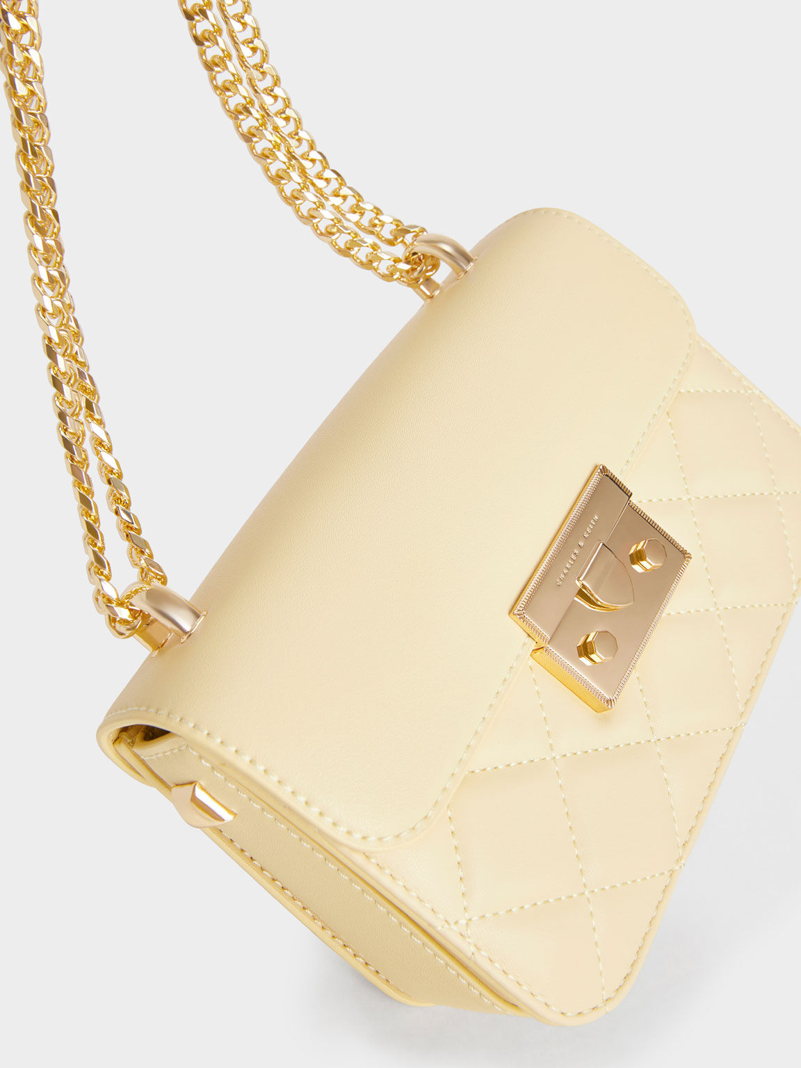 Butter Metallic Push Lock Chain Bag CHARLES KEITH TH