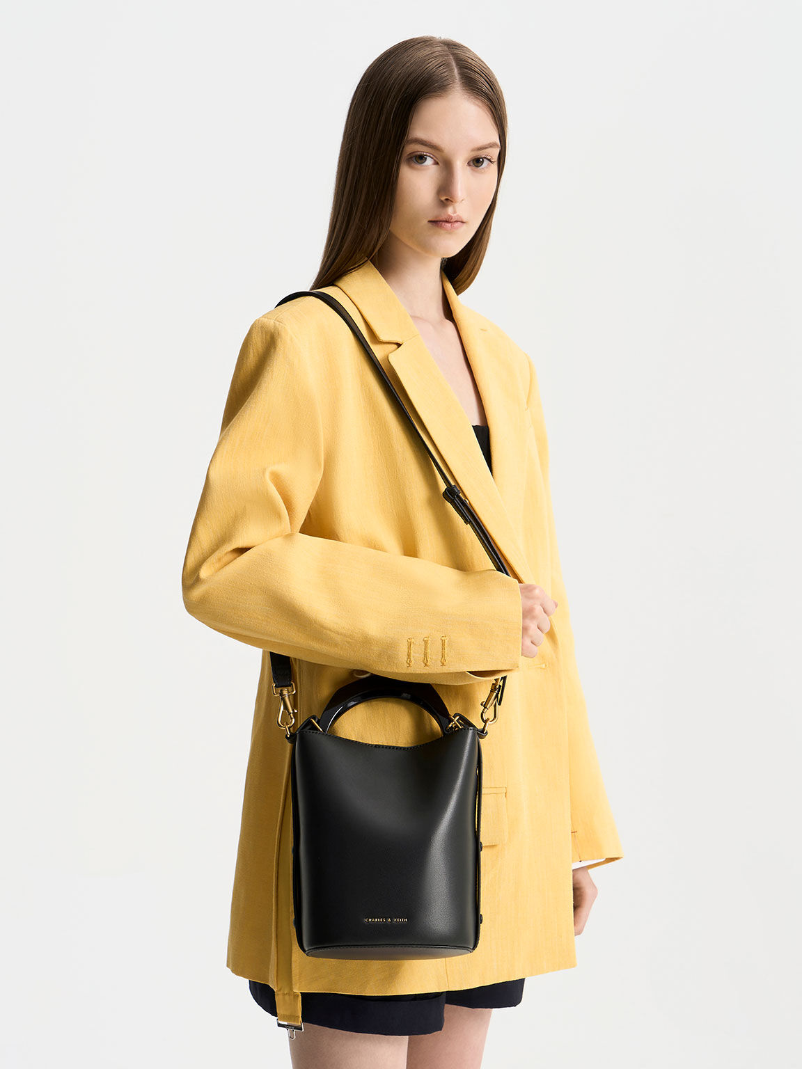 Velvet bow top detail bucket bag