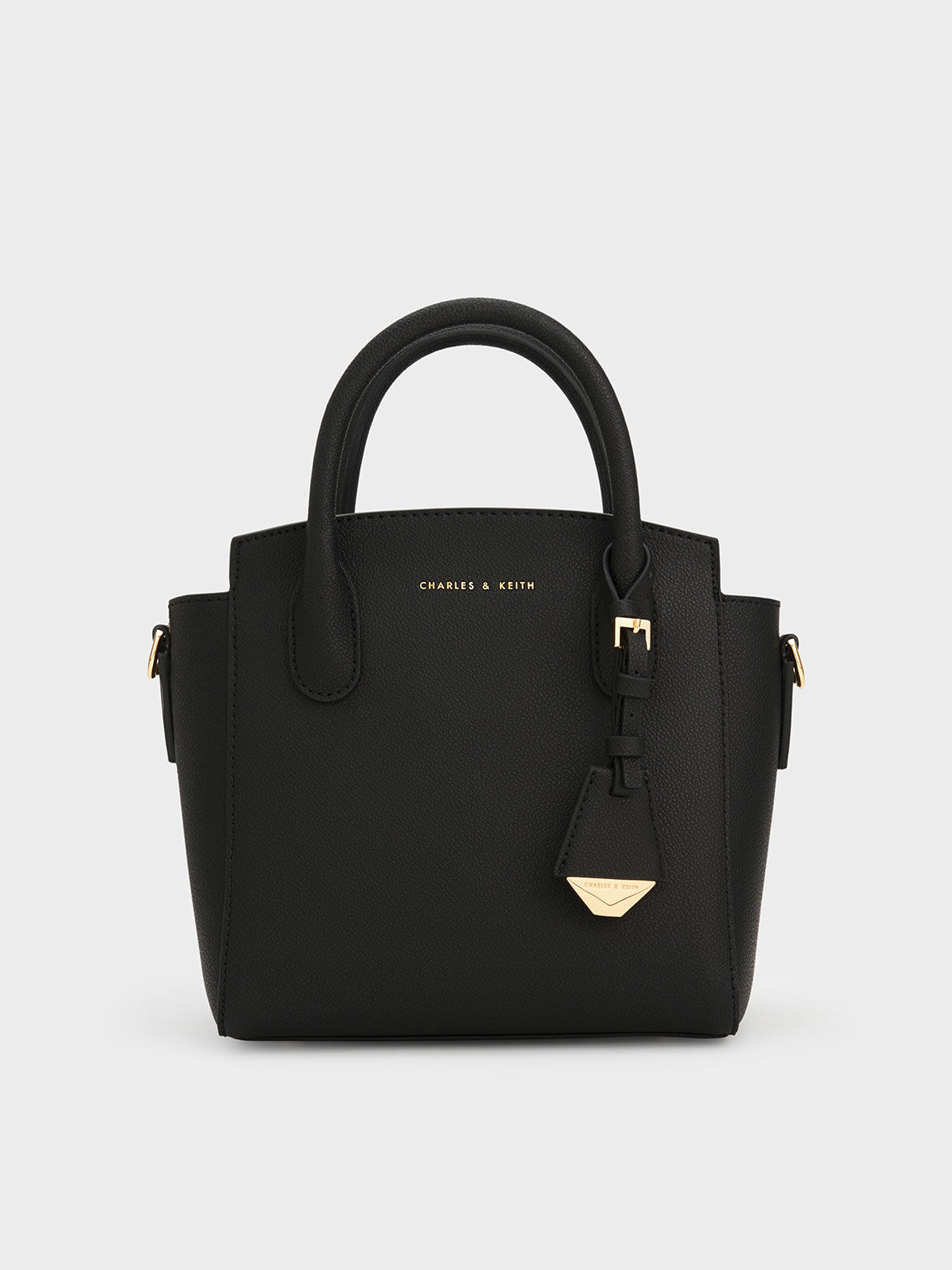Charles and keith top handle trapeze bag sales
