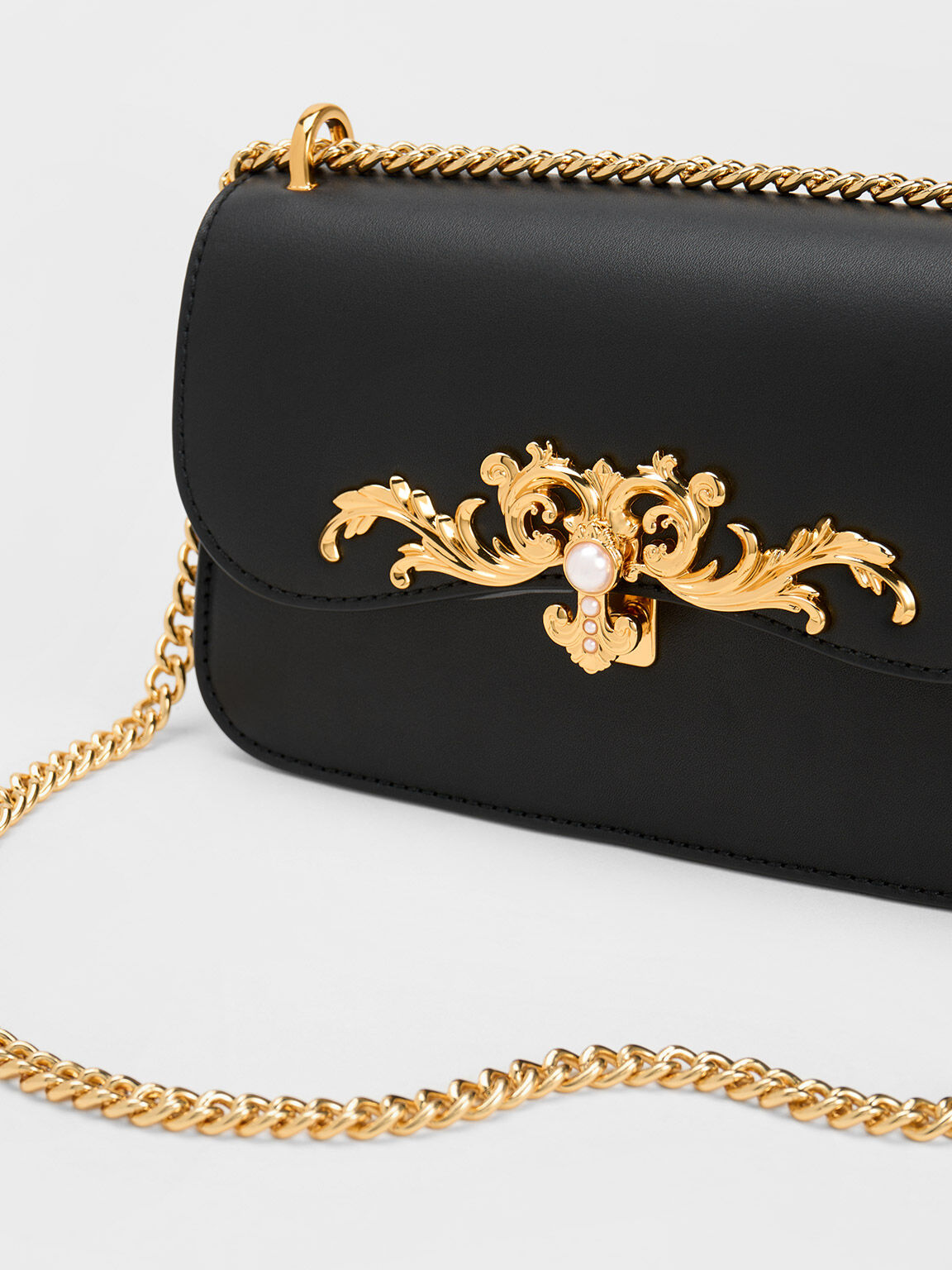 Black and 2025 gold crossbody bag