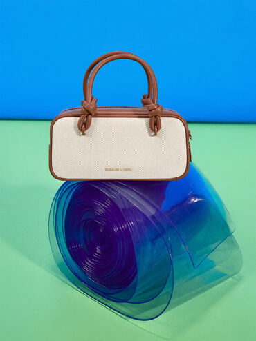 กระเป๋าสะพายข้างทรงยาวผ้าแคนวาสดีไซน์หูจับแบบผูกปมรุ่น Sammie, สีโทปแคนวาส, hi-res