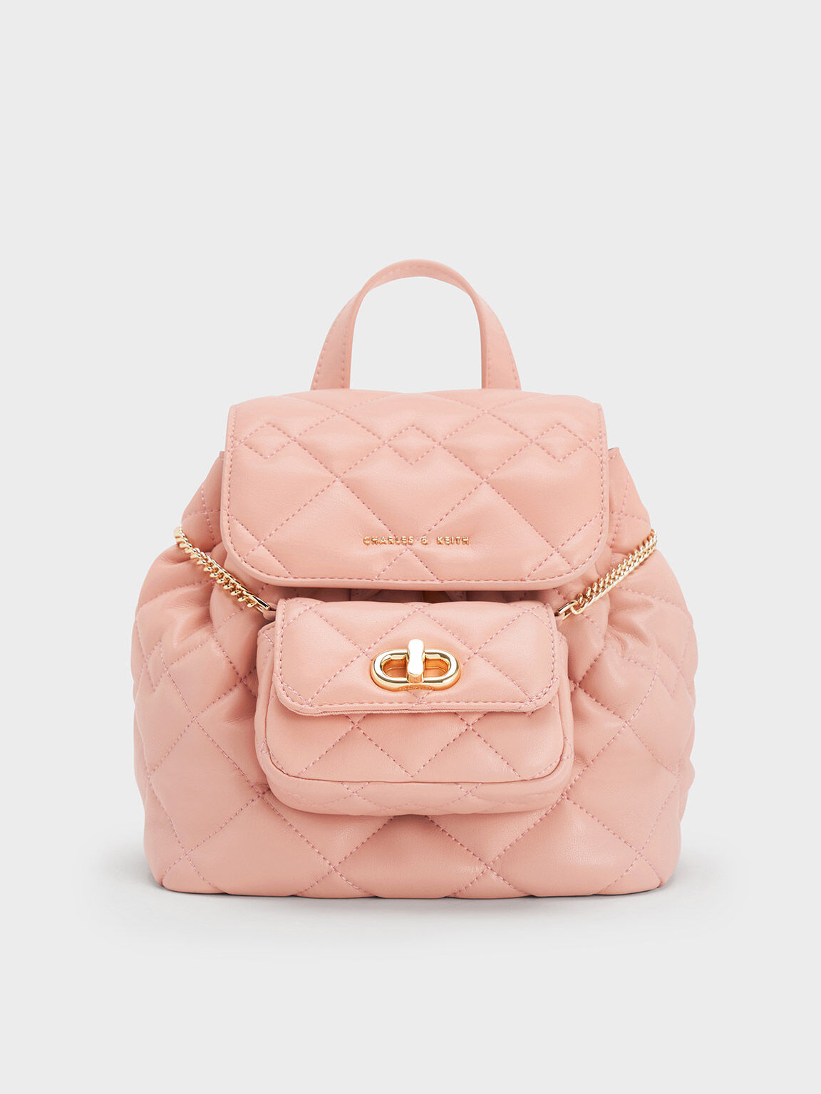 Pink quilted backpack on sale