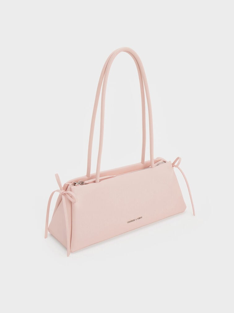 กระเป๋าสะพายไหล่ทรงสี่เหลี่ยมคางหมูแบบยาวตกแต่งด้วยโบว์รุ่น Hazel, สีซอฟต์พิงค์, hi-res