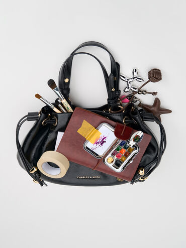 กระเป๋าทรงถังแบบเชือกรูดขนาดมินิรุ่น Moxie, สีดำ, hi-res