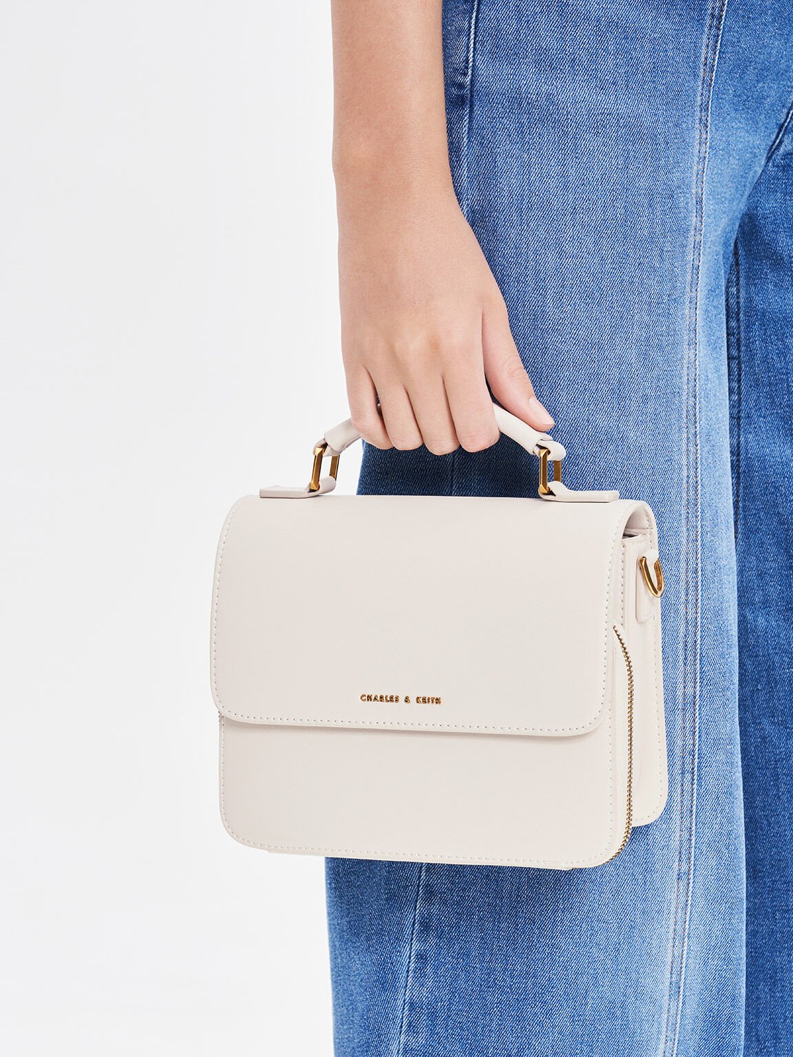 Charles and keith asymmetric front flap bag best sale