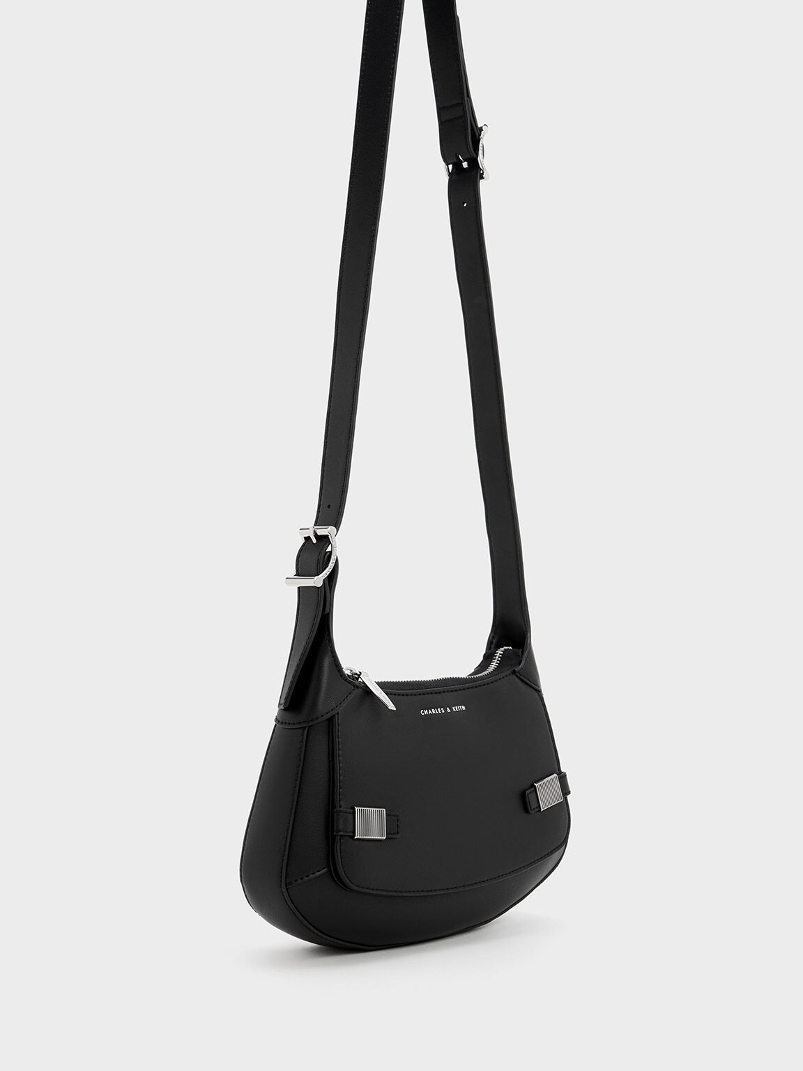 Metallic outlet messenger bag
