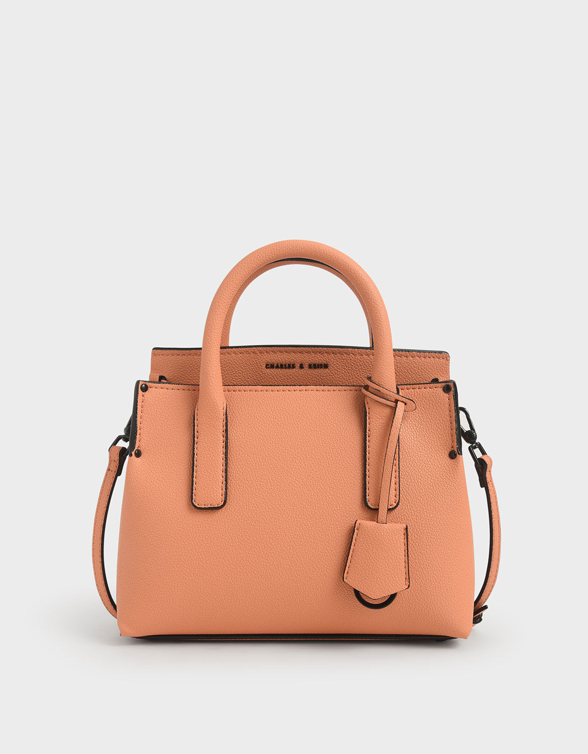 charles and keith peach bag