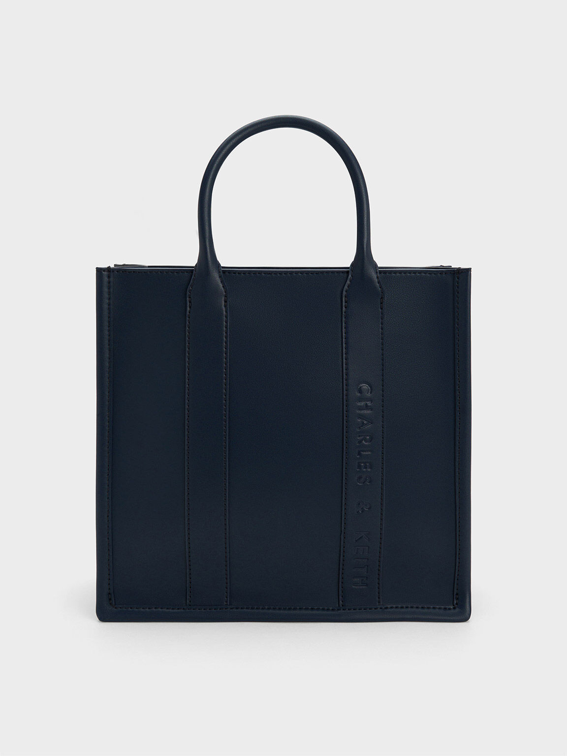 Charles and keith reversible bag store