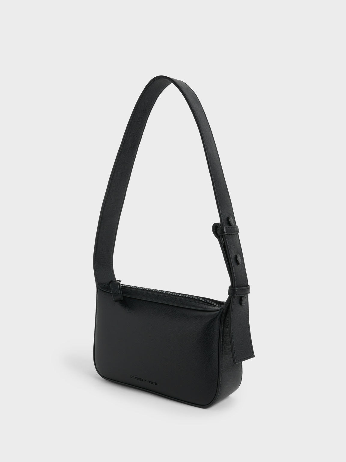Black boxy store crossbody bag