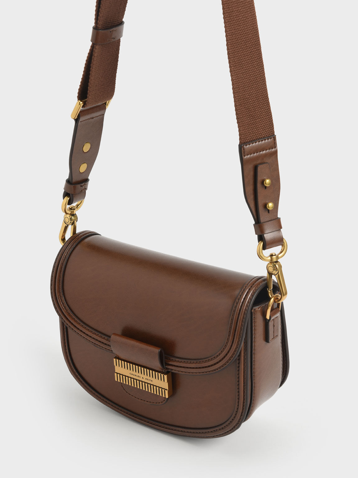 กระเป๋าสะพายข้าง Cognac Embellished Saddle Bag CHARLES & KEITH TH