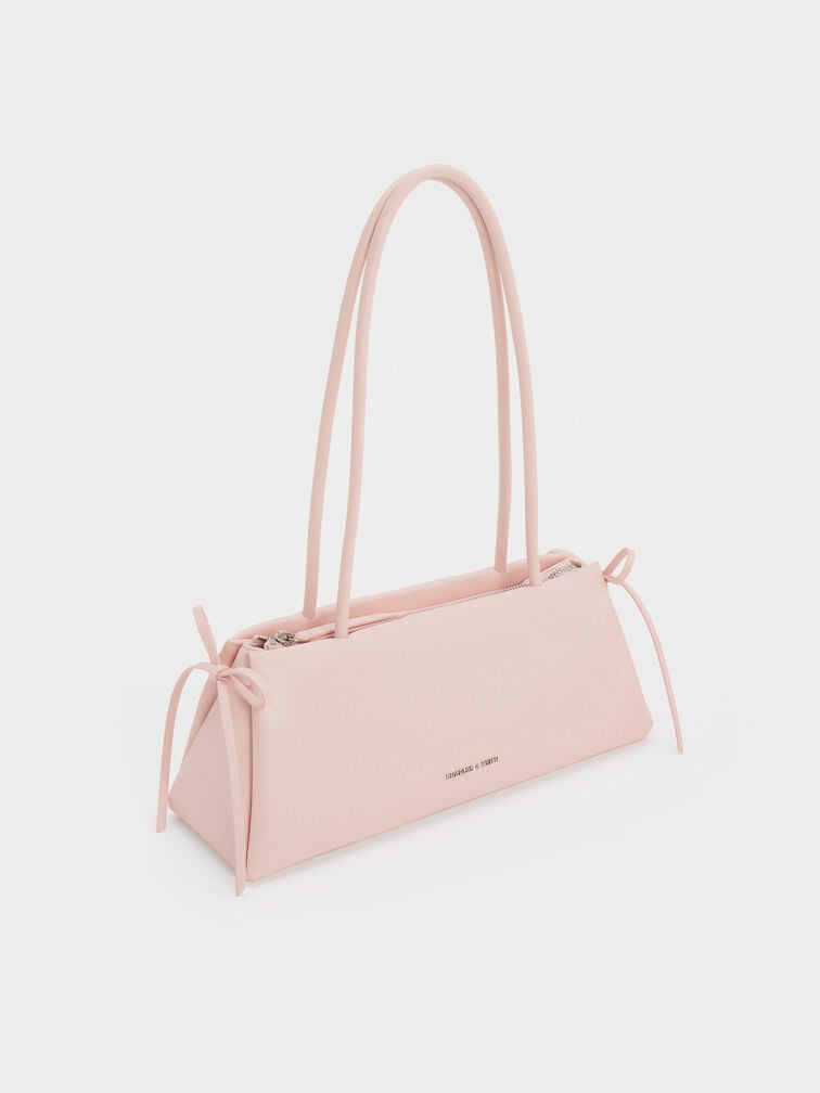 กระเป๋าสะพายไหล่ทรงสี่เหลี่ยมคางหมูแบบยาวตกแต่งด้วยโบว์รุ่น Hazel, สีซอฟต์พิงค์, hi-res