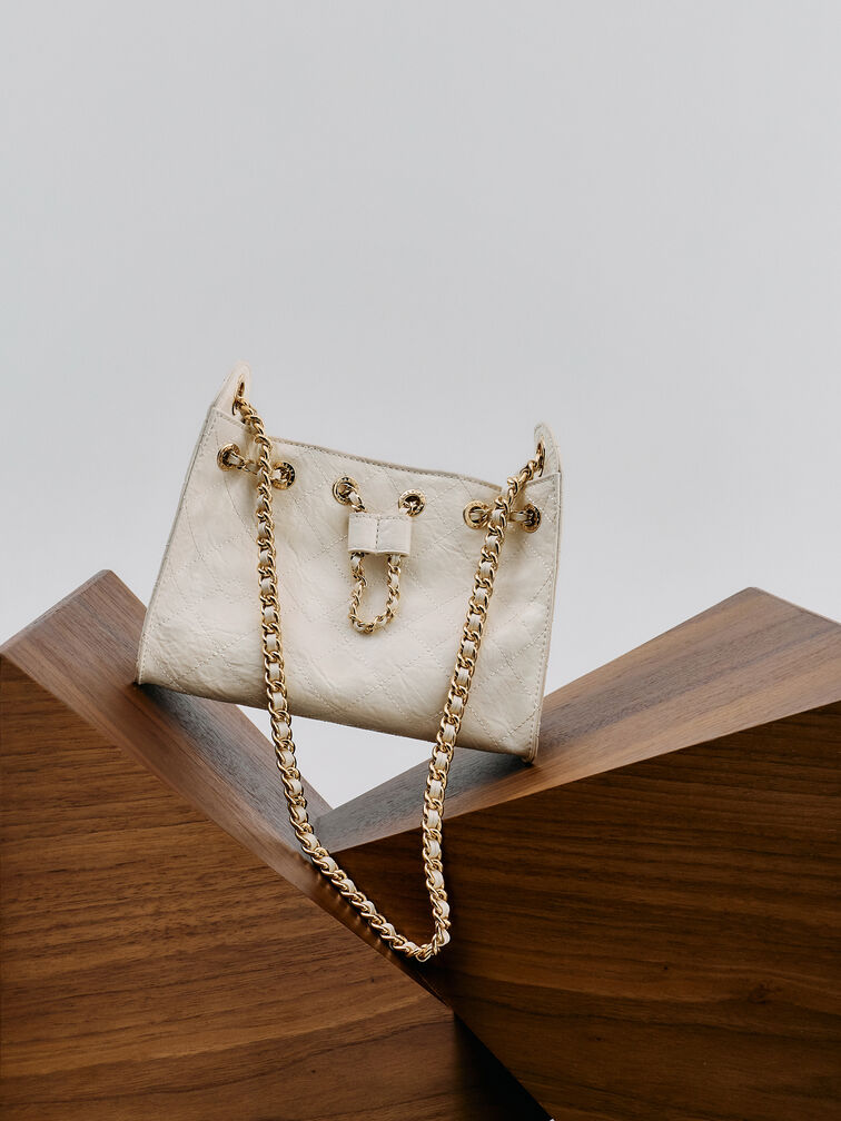 กระเป๋าทรงถังลวดลายควิลท์พร้อมเชือกรูดรุ่น Duo, สีครีม, hi-res