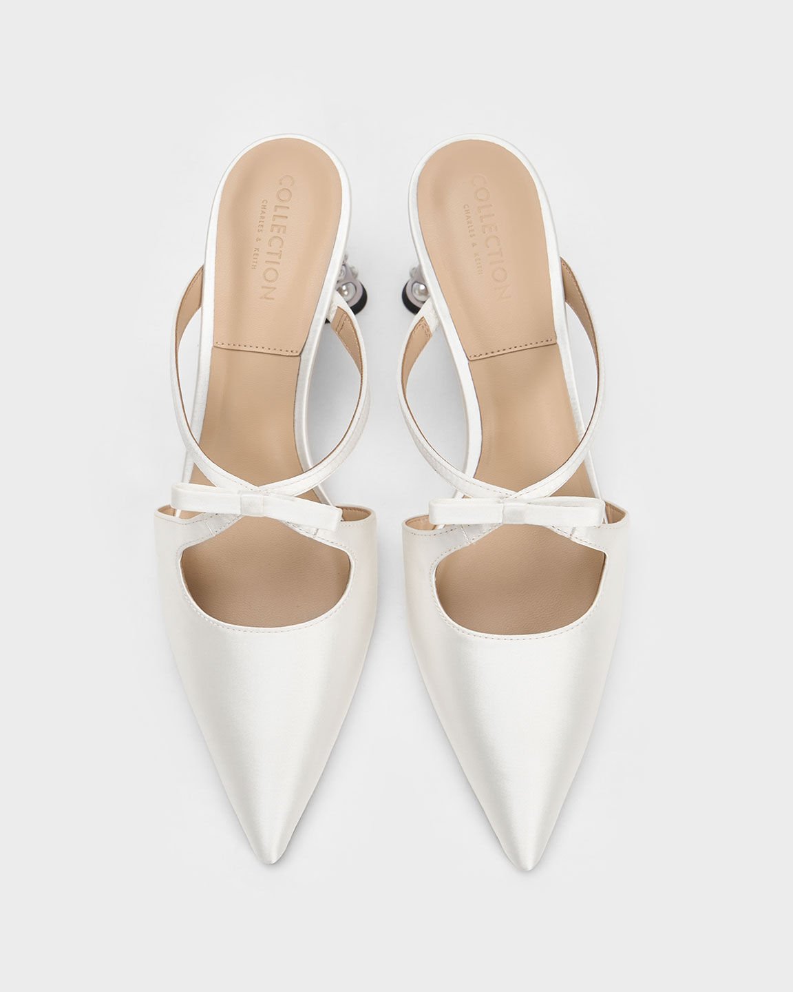 Pointed toe bow mules deals