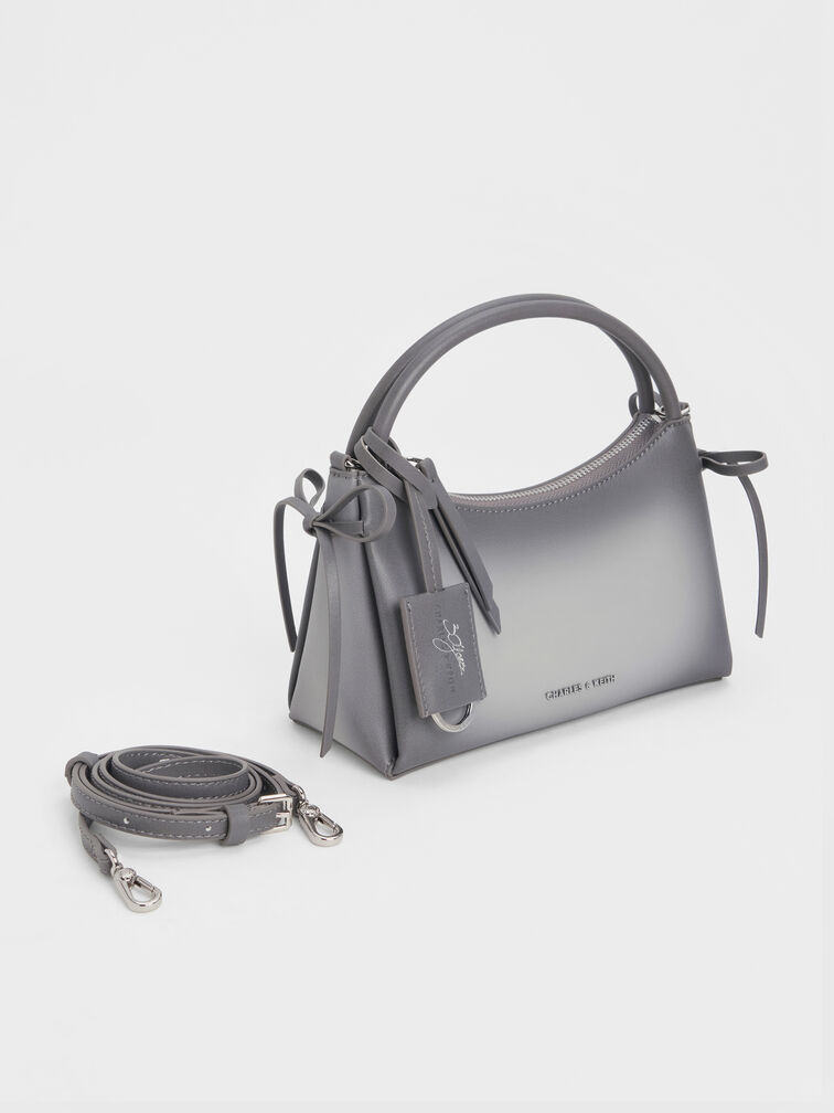 กระเป๋าถือประดับโบว์ดีเทลขัดเงารุ่น Hazel, สีเทา, hi-res