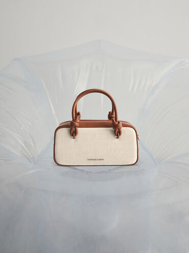 กระเป๋าสะพายข้างทรงยาวผ้าแคนวาสดีไซน์หูจับแบบผูกปมรุ่น Sammie, สีโทปแคนวาส, hi-res