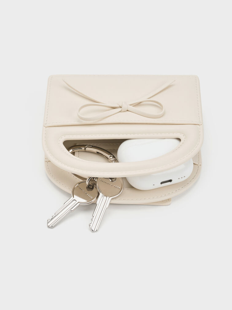 กระเป๋าคล้องข้อมือประดับโบว์รุ่น Reese, สีครีม, hi-res