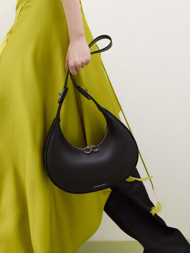 You can never have too many effortlessly chic bags in your rotation -- like this hobo bag. Featuring a sleek crescent silhouette with a turn-lock detail on the shoulder strap, this bag possesses a distinctive charm. In clean chalk, it is a truly versatile piece that will elevate any outfit you pair it with. Carry it slung over the shoulder, or open up the turn-lock to attach the extended strap for more styling options., Noir, hi-res
