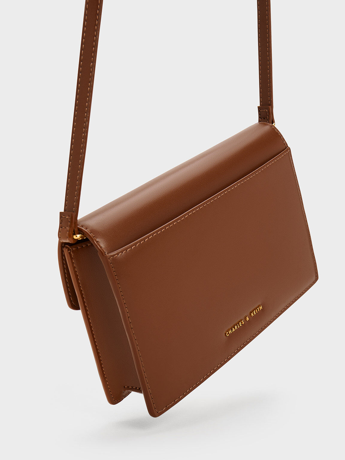 Chocolate Padlock Envelope Crossbody Bag CHARLES KEITH TH