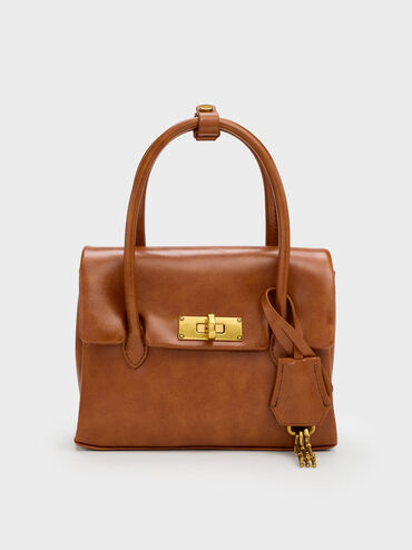 กระเป๋าโท้ทมินิดีเทลตัวล็อคแบบหมุนรุ่น Kerry, สีดิสเทรสด์แทน, hi-res