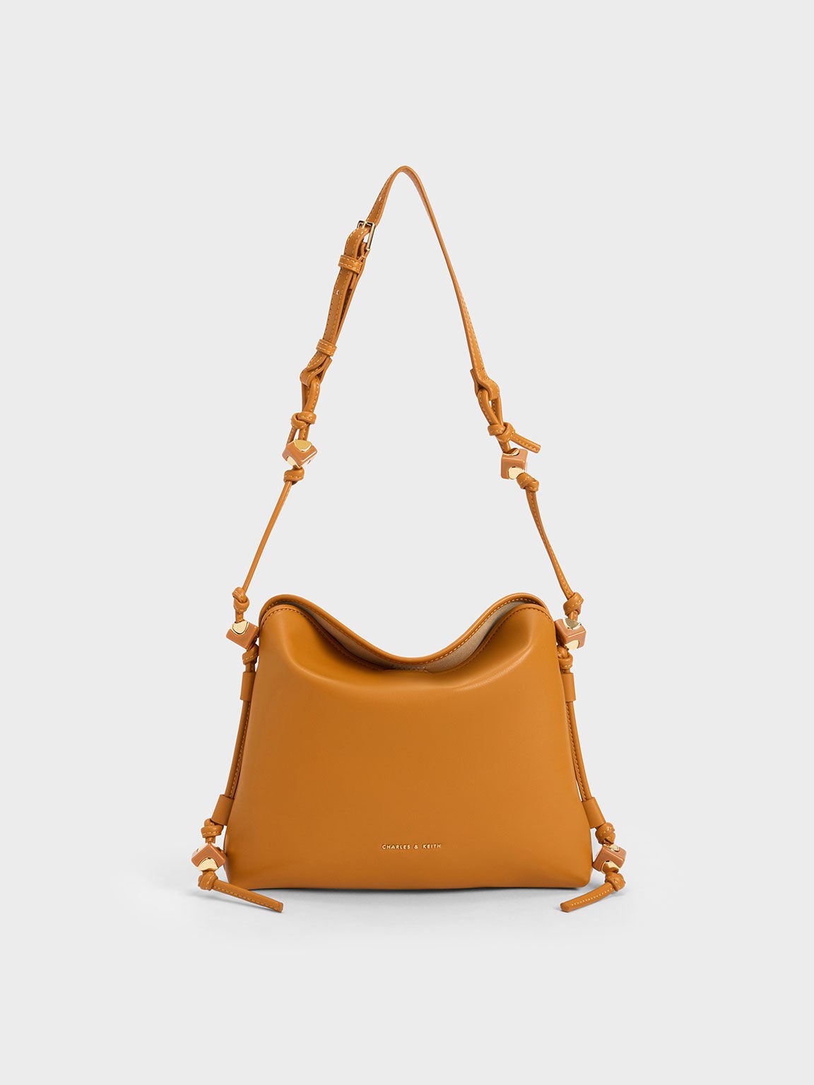 Sling bag 2025 charles & keith