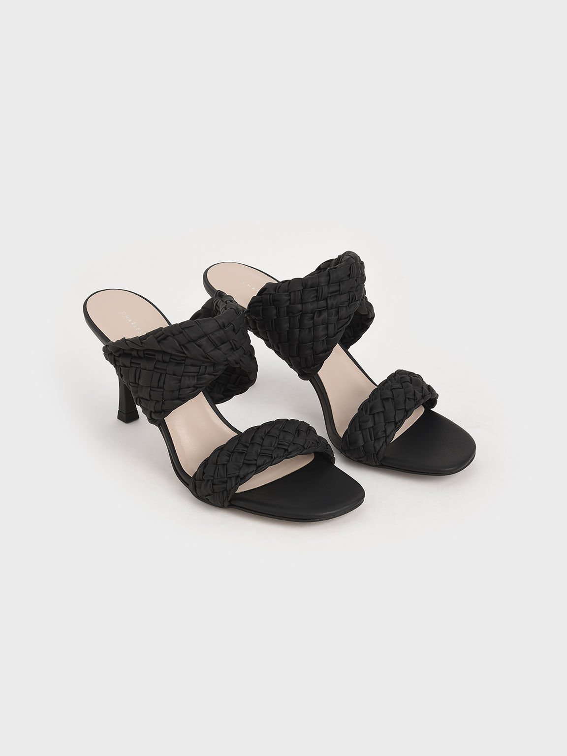 black woven heeled mules