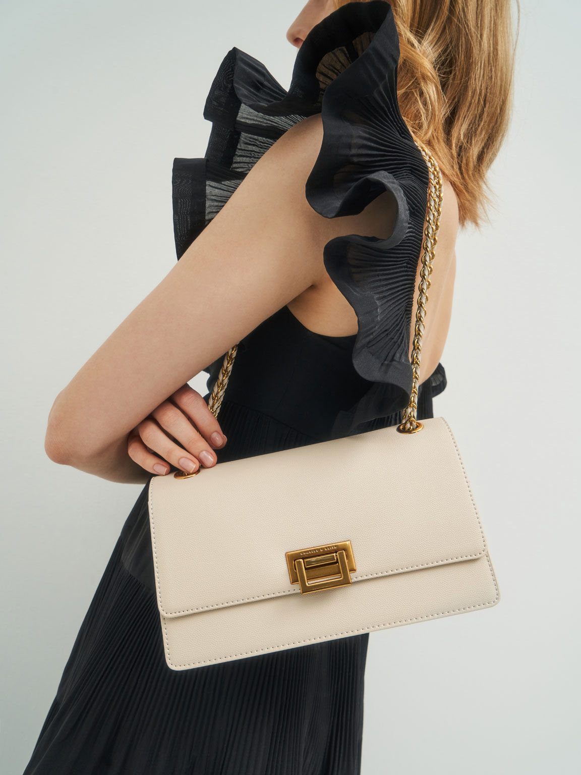 Evening bag outlet with strap