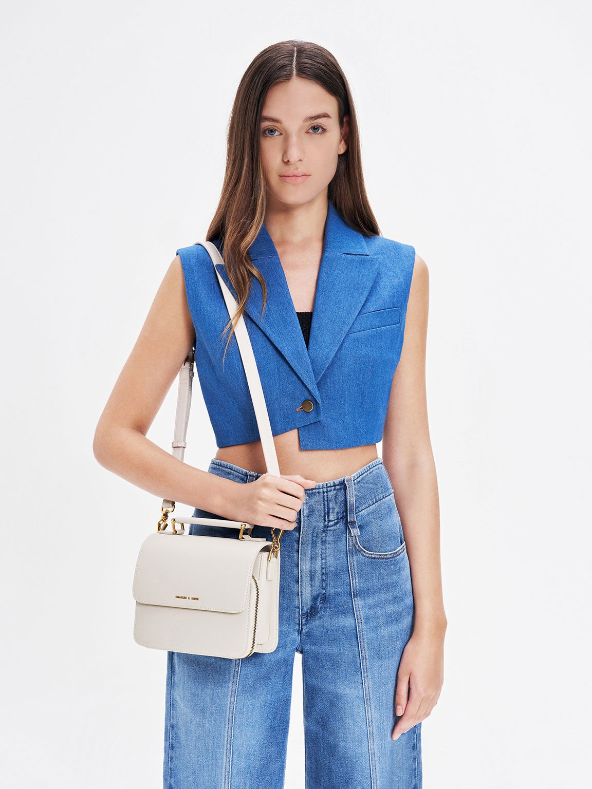 Charles and keith asymmetric front flap bag best sale