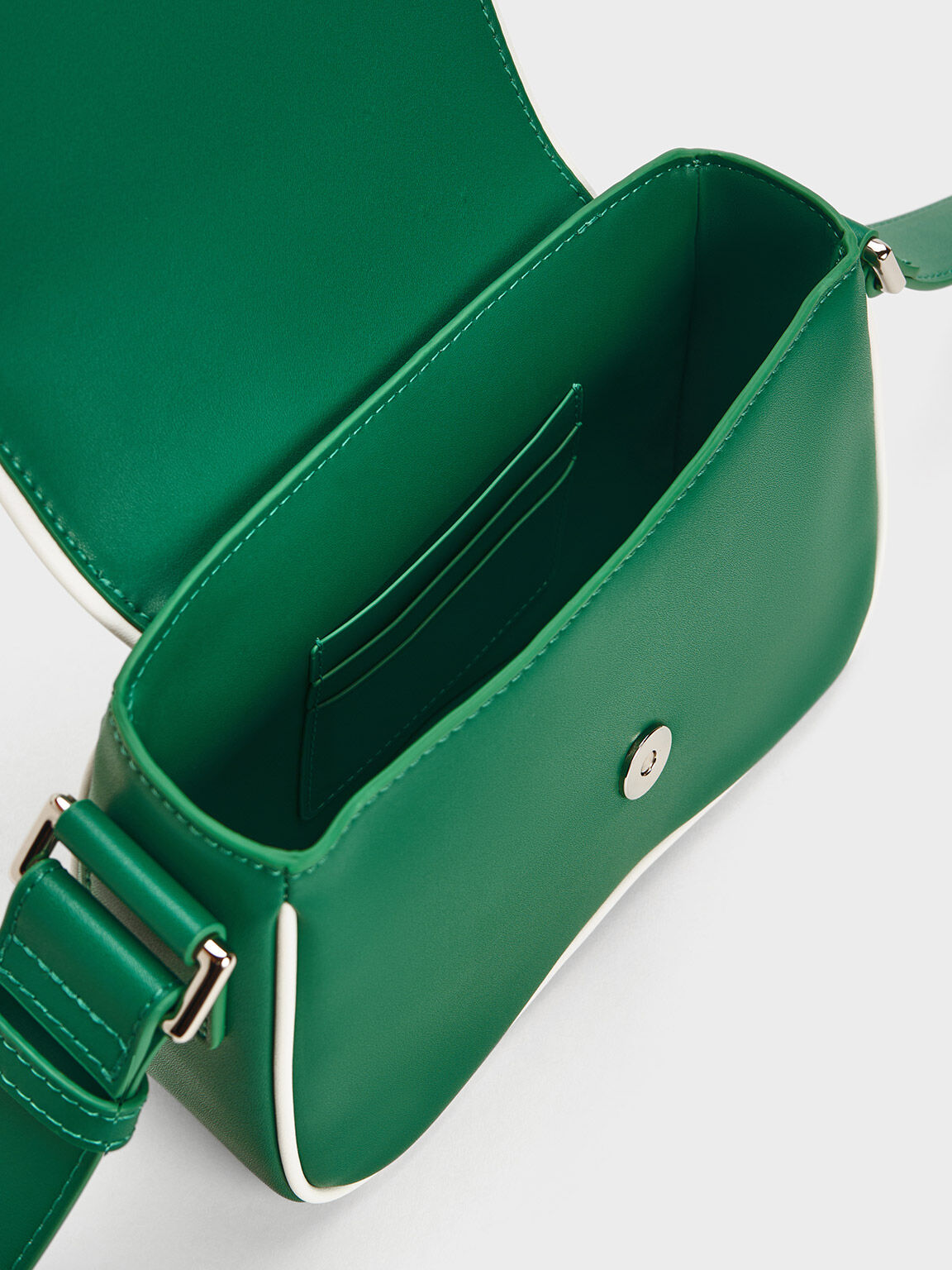Button spot curve shoulder bag deals