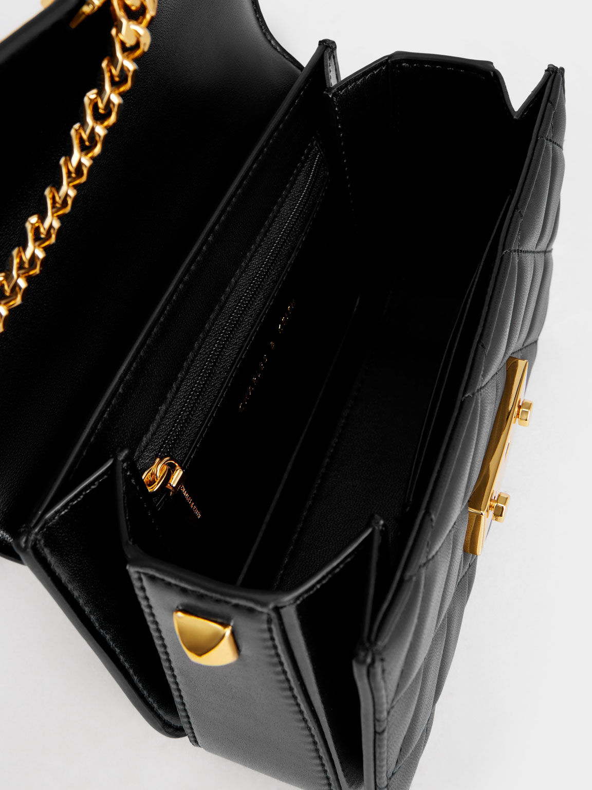Charles and keith new arrivals metallic push lock bag