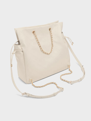 กระเป๋าเป้สองฟังก์ชันที่ปิดแบบเชือกรูดดีไซน์ลายควิลท์พร้อมสายโซ่ถักรุ่น Duo, สีครีม, hi-res