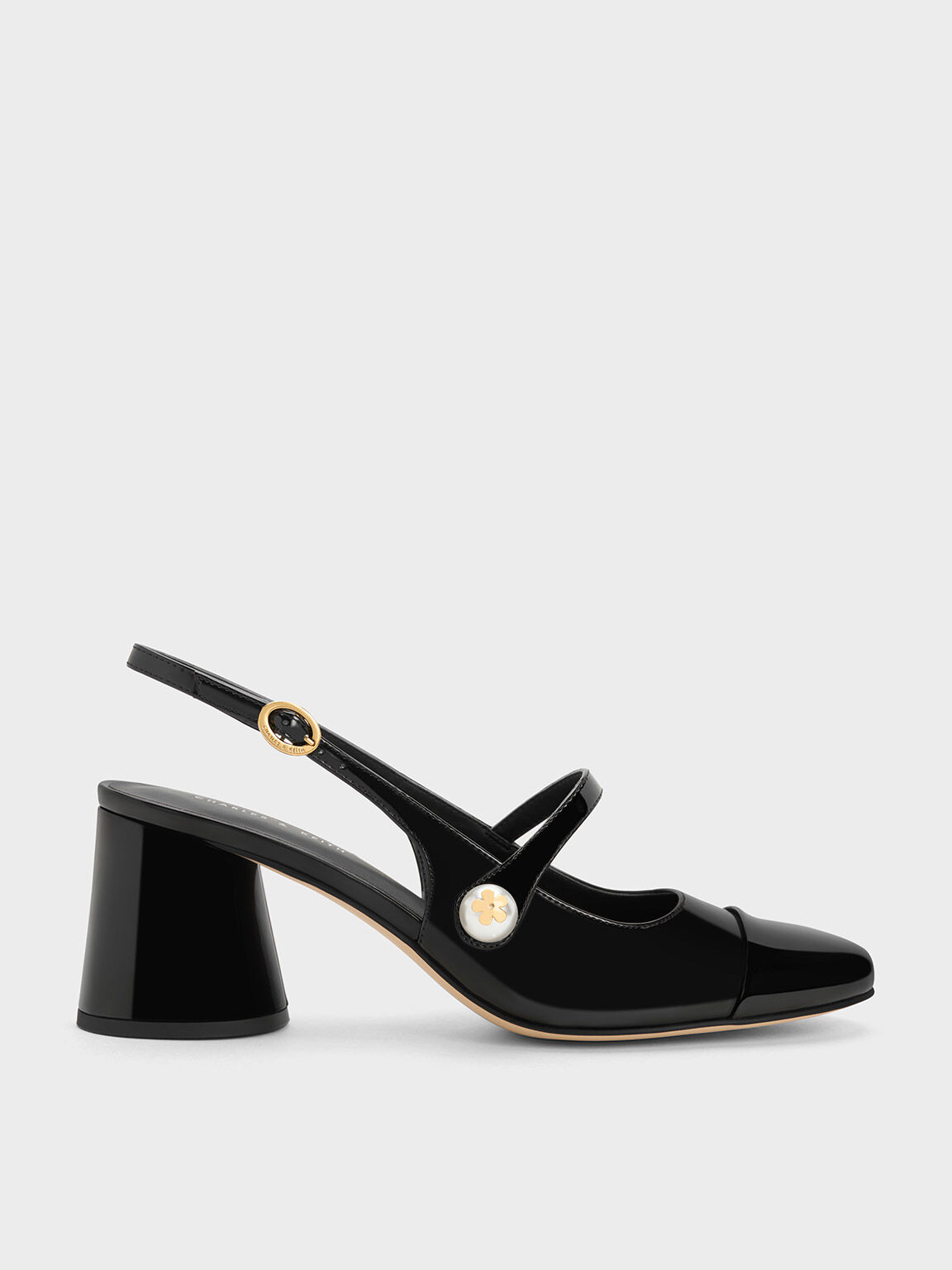 Gucci black top patent leather pumps