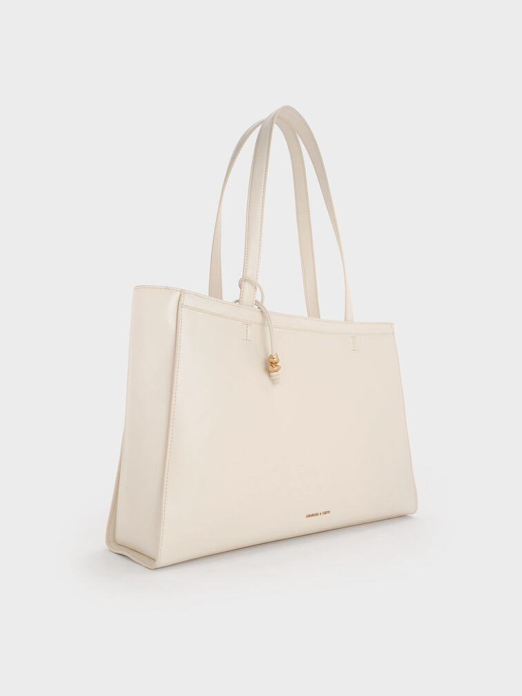 กระเป๋าโท้ทดีเทลมีมิติรุ่น Augustine, สีครีม, hi-res