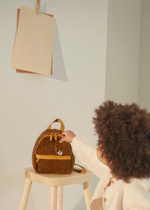 Girls’ bear motif furry backpack (front view) – CHARLES & KEITH