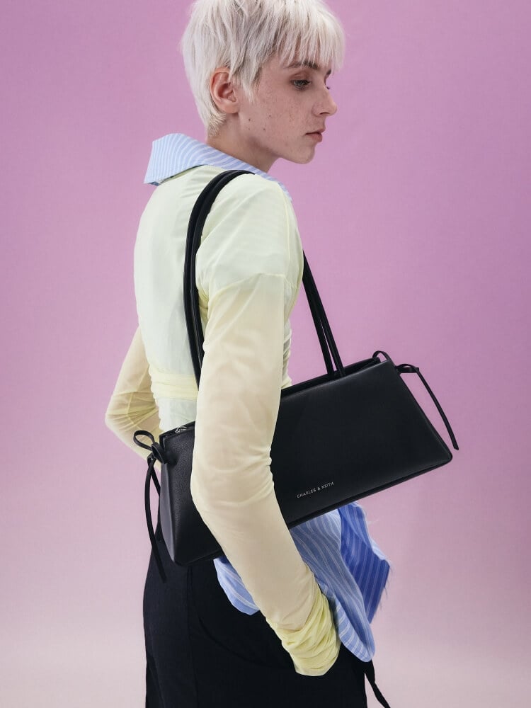 Women’s noir Hazel bow elongated trapeze shoulder bag - CHARLES & KEITH