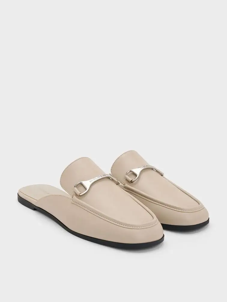 Mules are typically designed with covered toes and open backs.