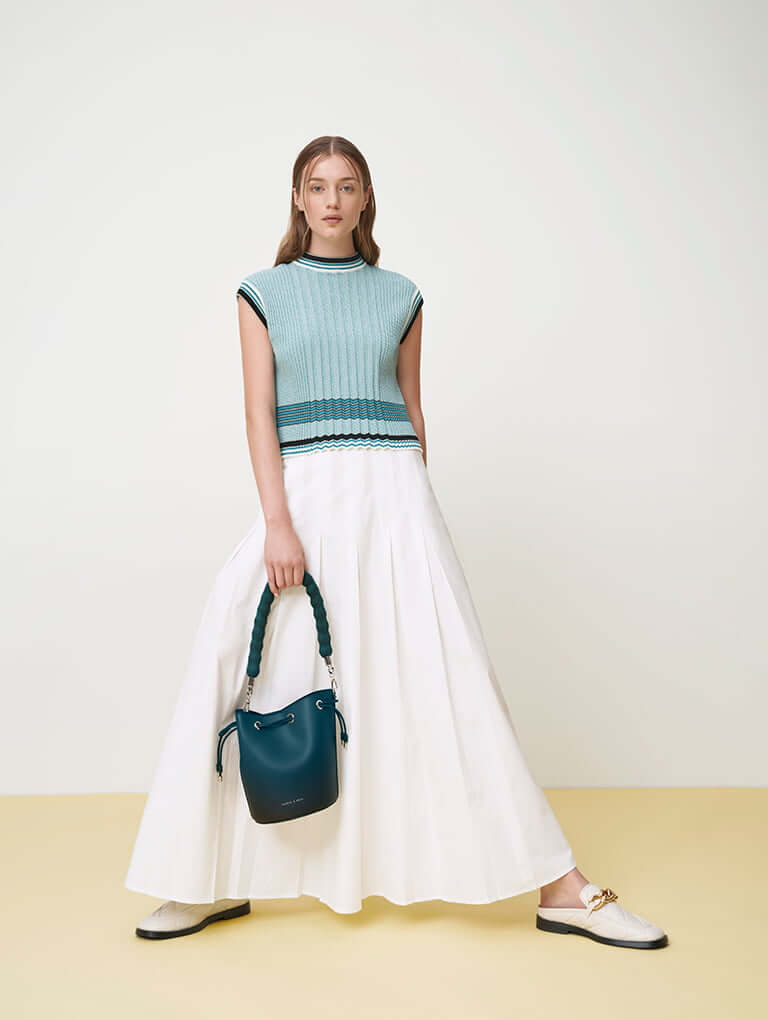 Lana Bucket Bag in green and Quilted Chain Loafer Mules in chalk - CHARLES & KEITH