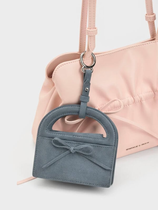 Women’s Reese bow top handle wristlet in smoky blue - CHARLES & KEITH