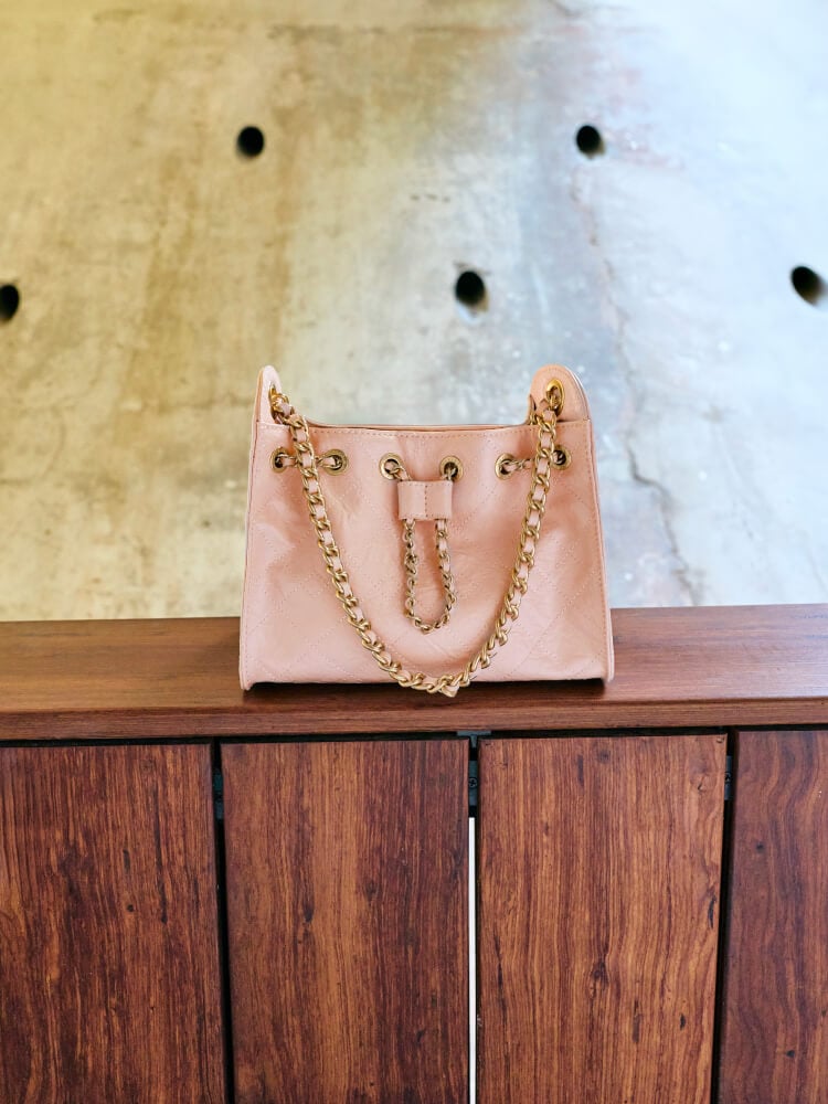 Women’s Duo quilted drawstring bucket bag in soft pink - CHARLES & KEITH