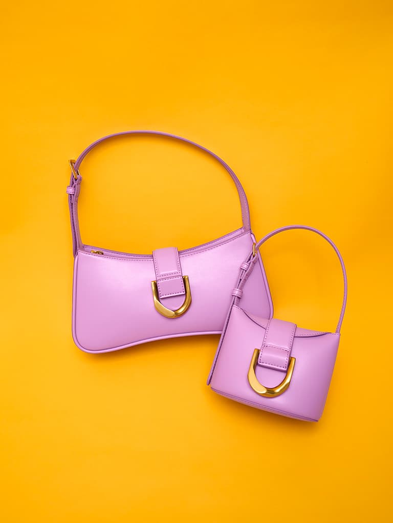 Gabine Curved Shoulder Bag and Gabine Bucket Bag, both in violet – CHARLES & KEITH