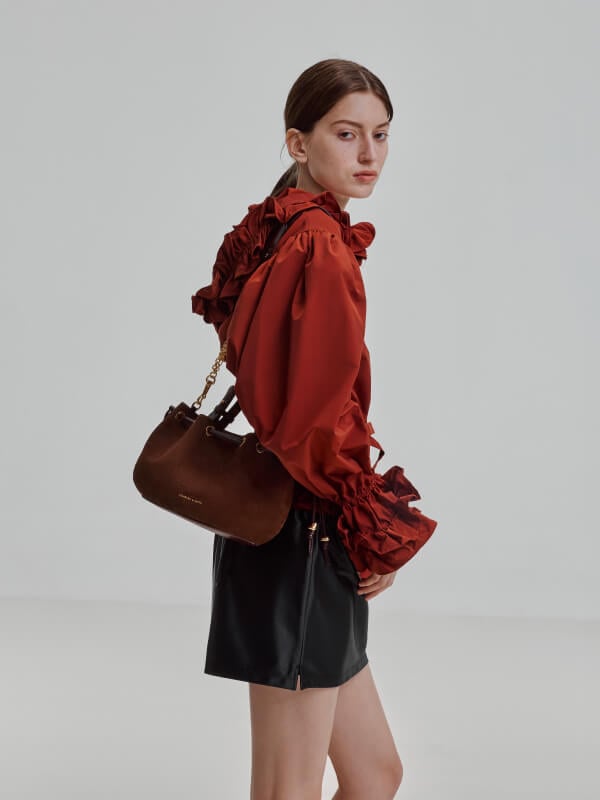 Women’s mini Moxie drawstring bucket bag in dark brown - CHARLES & KEITH