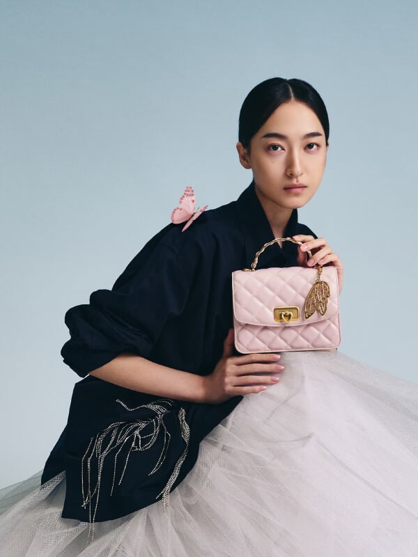 Women’s gift set: Cressida quilted top handle bag with bag charms in cotton candy pink - CHARLES & KEITH TH
