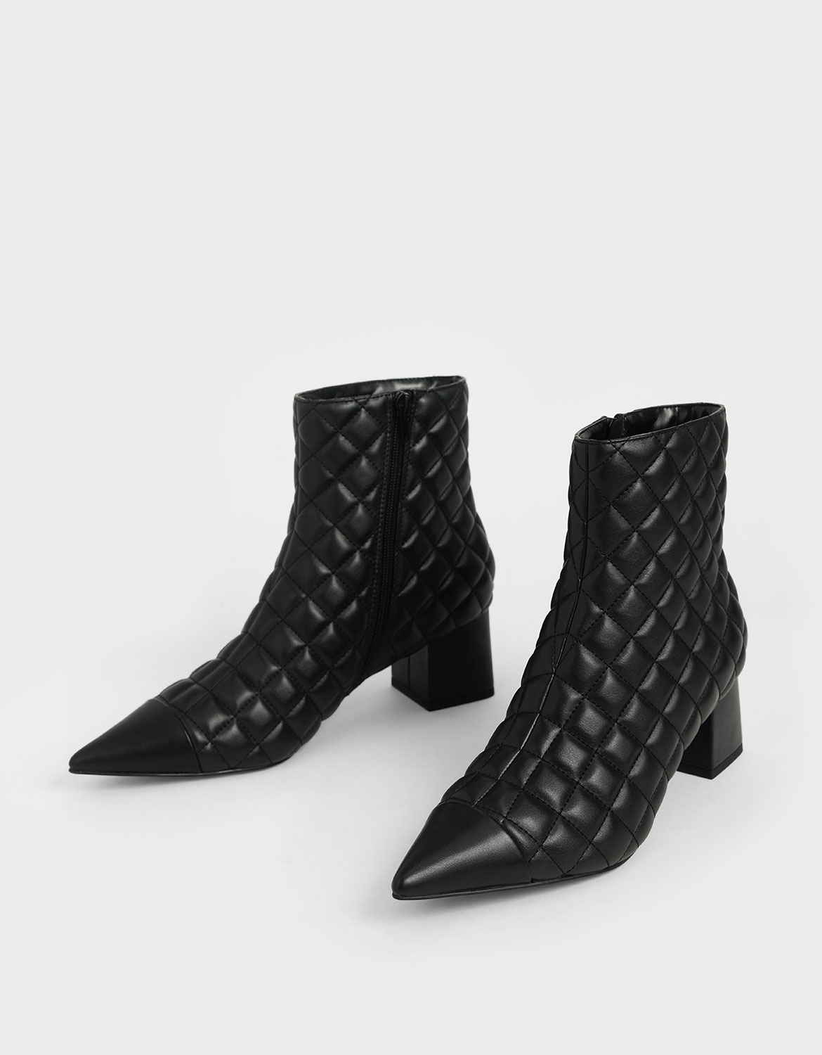 Women’s black quilted ankle boots