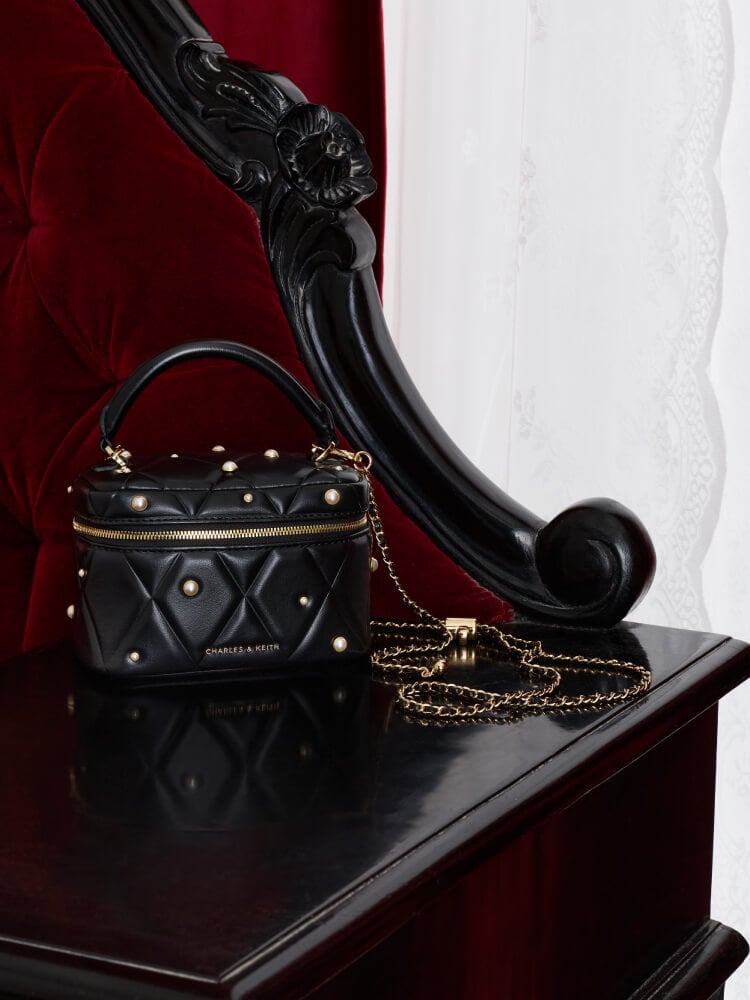 Black Arwen Quilted Pearl-Embellished Top Handle Vanity Bag - CHARLES & KEITH