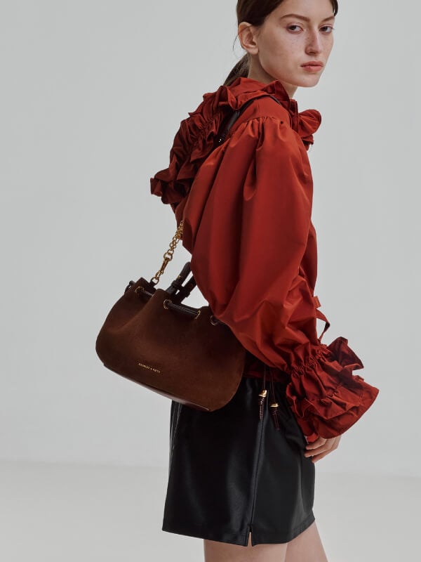Women’s mini Moxie drawstring bucket bag in dark brown - CHARLES & KEITH