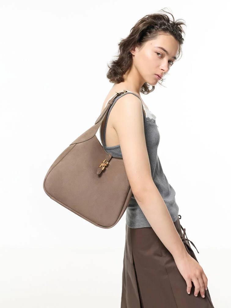 Suede bags require special care as their napped texture makes them more prone to stains and marks.