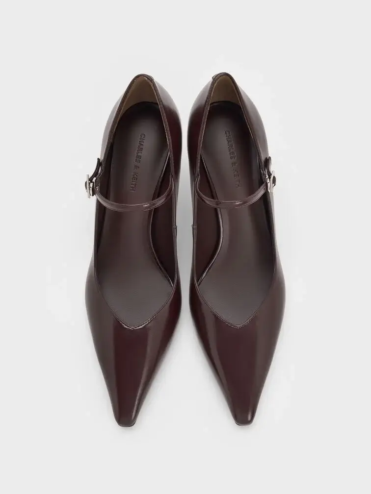 Maroon pointed-toe stiletto-heel pumps, a formal option for special occasions.