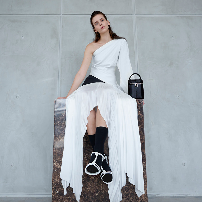 Women’s knotted strap sandals in white and two-way zip bucket bag – CHARLES & KEITH